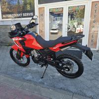 SRT 125 DX, Navigace a zrcadlení, bohatá cestovní výbava